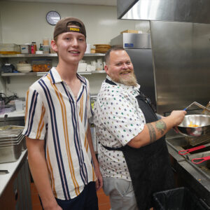FHK & Tommy Begnaud Owner of Mr. Paul's making fries